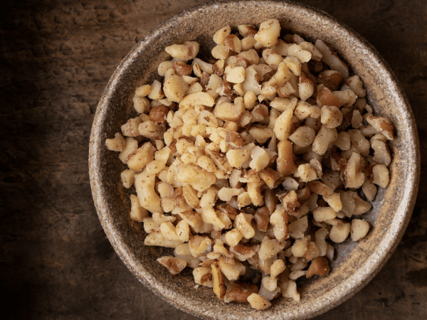 chopped nuts to make the perfect Banana Bread with a Tropical Twist