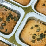 Freshly baked banana bread cooling in loaf pans, illustrating common banana bread mistakes and solutions.