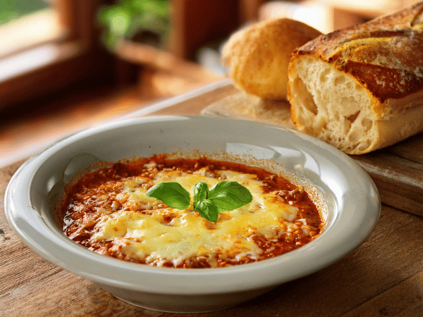 Lasagna Soup Served with Garlic Bread